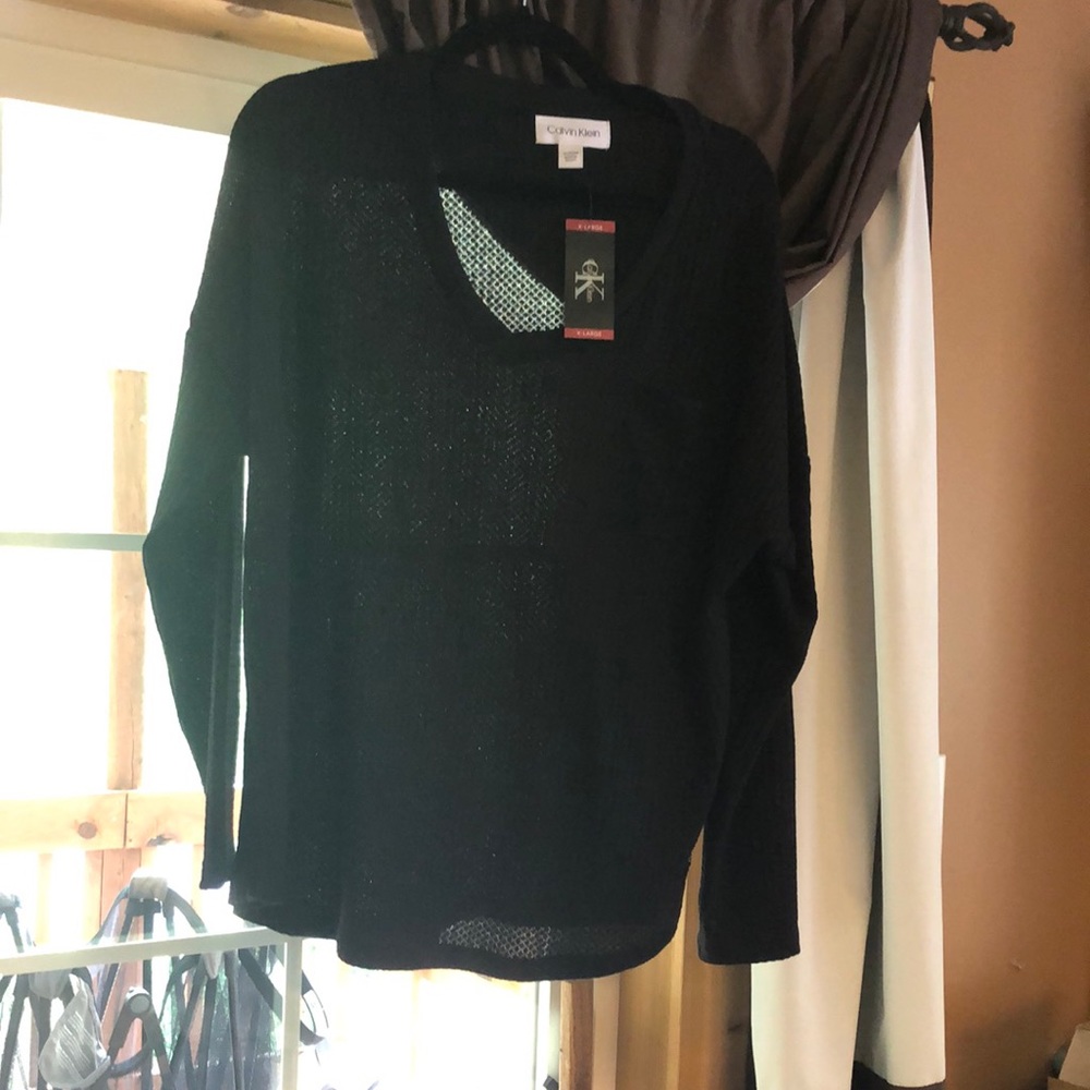 Women’s Calvin Klein waffle knit long sleeved top. Various sizes.